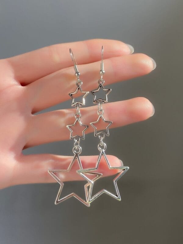 Brincos pendentes estrela
