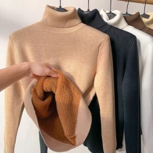 Um novo suéter grosso de gola alta para mulheres no inverno 2026 , combinado com elegante top térmico outono e